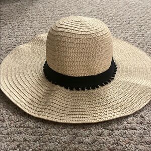 Elegant Floppy Tan Sun Hat with Black Band